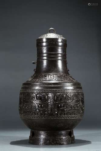 A bronze ‘taotie’ Hu vase with cover