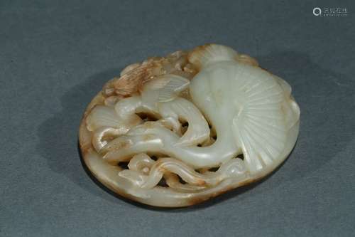 A white jade round pendant