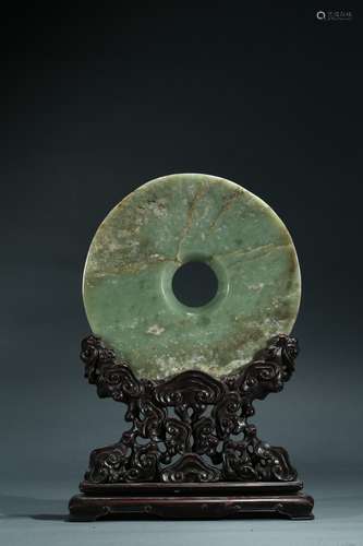 A celadon jade disc table screen