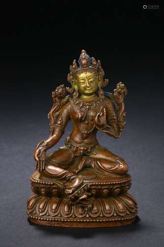 A gilt painted bronze tara