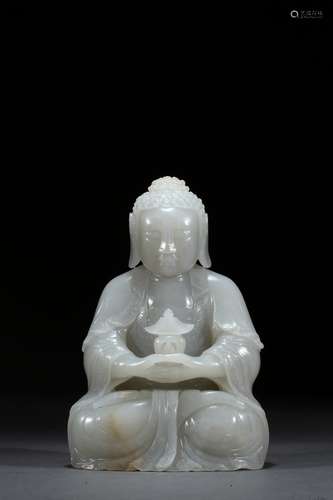 A white jade carved figure of Amitayus