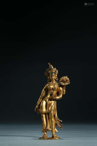 A gilt-bronze figure of white tara