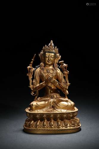 A gilt-bronze figure of Manjusri