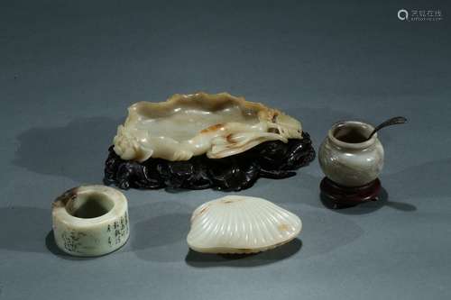 A set of four jade scholar objects