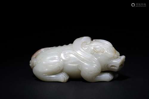 A white jade carved mythical beast