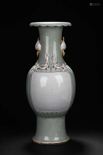 A celadon and white glaze vase