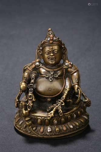 A small bronze silver inlaid bodhisattva