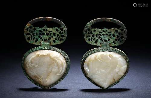 A pair of bronze and white jade plaques