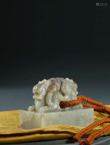 An imperial celadon jade 'double-dragon' seal