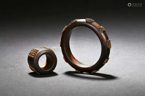 A set of agarwood bangle and archer's ring