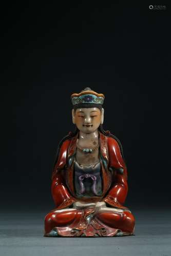 A famille rose figure of seated Guanyin