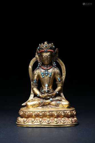 A gilt-bronze figure of Amitayus