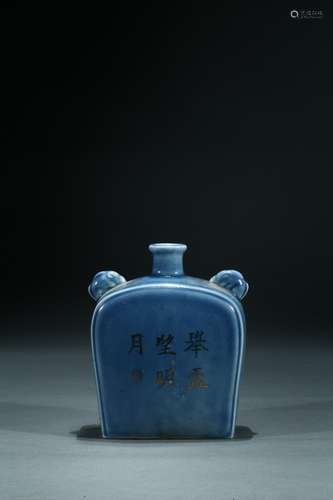 A gilt-decorated blue glazed jar