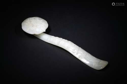 A white jade ‘plum and birds’ ruyi sceptre