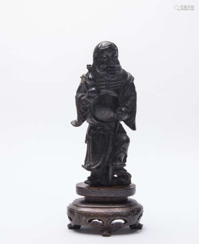 A Chinese Figure Of Man