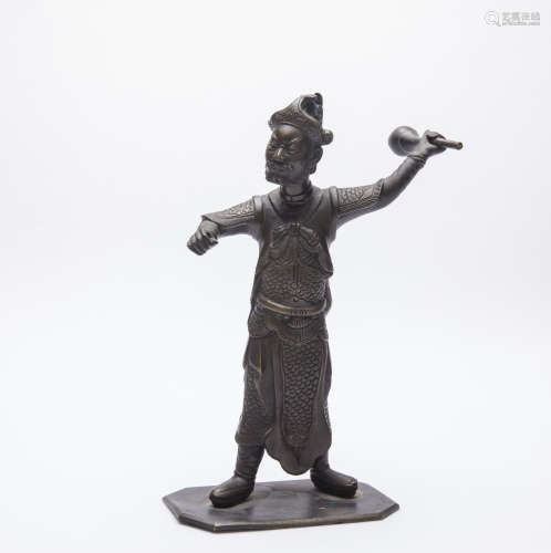 A Chinese Bronze Figure Of Man