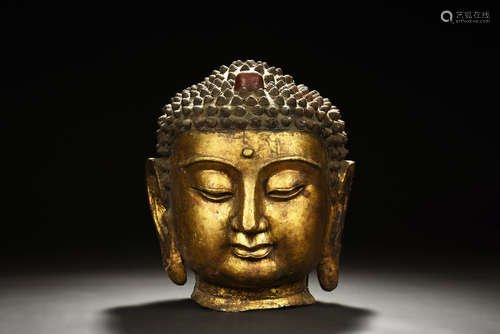 Gilt bronze Shakyamuni head