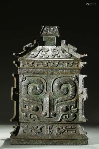Archaic bronze 'Taotie' rectangular ritual vessel, yi