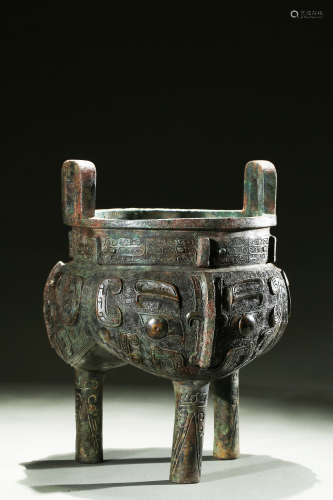 Archaic bronze 'Taotie' tripod censer