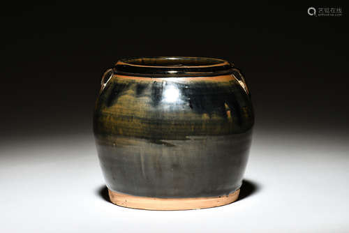 Black and brown glazed jar with two small handles