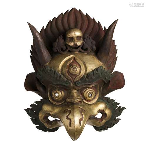 Tibetan gilt copper mask of Garuda, 19thC