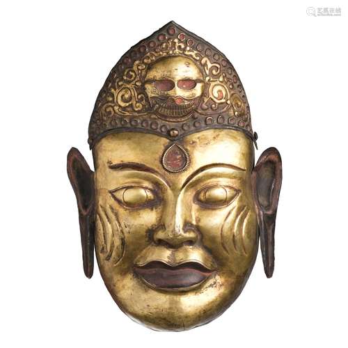 Tibetan gilt copper mask of a Lama