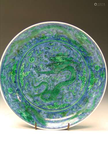 Chinese blue and green glazed dragon dish, Jiaqing Mark. Diam. 25.5 cm. provenance: A New York collector.