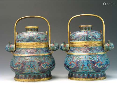 A pair of Chinese cloisonne lidded vessels. Qing Dynasty.