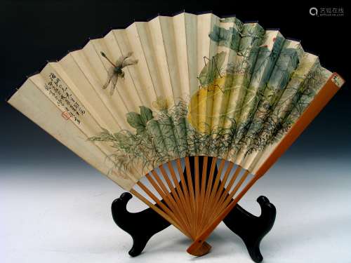 Chinese water color painting on paper fan with calligraphy on the back.