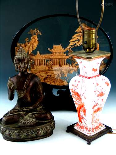 Three Chinese decorative items.