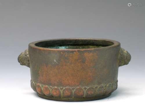 Chinese bronze incense burner with lotus leaves decorations.