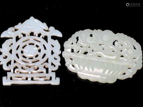 Two Chinese carved white jade flowers.