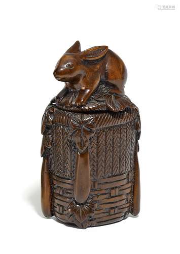 WOODEN BOX WITH SITTING HARE.