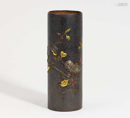 CYLINDRICAL VASE WITH FLOWERING BRANCH IN RELIEF.