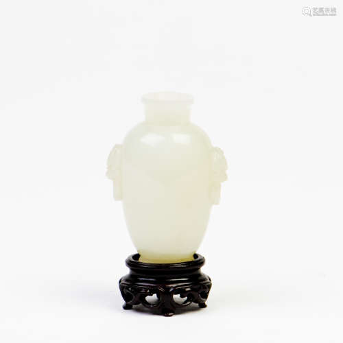A WHITE JADE VASE, QING DYNASTY, 18TH CENTURY