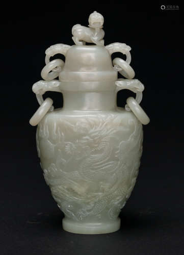 A Celadon White Jade Carved ‘Double Dragon Chasing Pearl’ Cover Vase