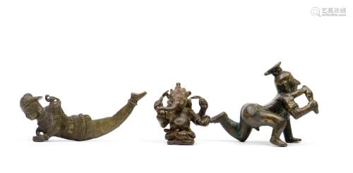 A SET OF THREE INDIAN BRONZE HEAD SCULPTURES