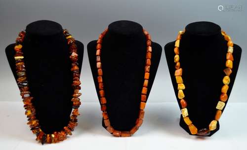 Group of Three Amber Strands Necklaces