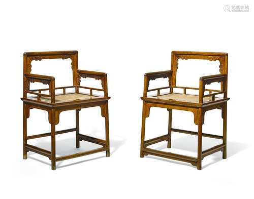 A pair of huanghuali low back arm chairs, Meiguiyi 17th/18th century