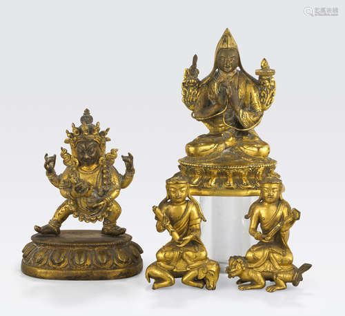 An assembled group of four gilt copper alloy Buddhist figures Qing dynasty, circa 18th century