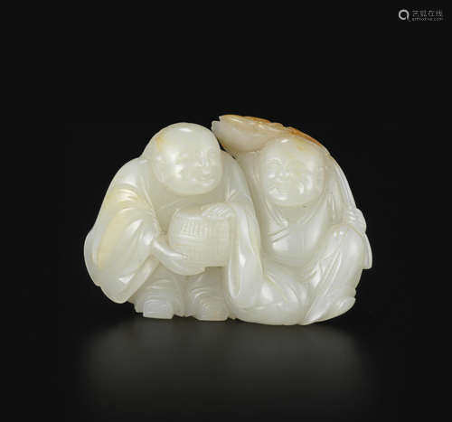 A pale greenish-white jade carving of the Hehe twins 18th century