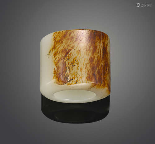 A white jade archer's ring with russet skin Qing dynasty