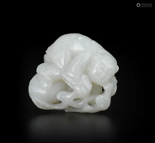 A white jade carving of boy, bat and peaches 18th/19th century