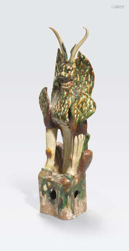 A magnificent sancai glazed pottery figure of an earth spirit Tang dynasty