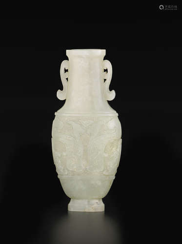 A greenish-white jade vase