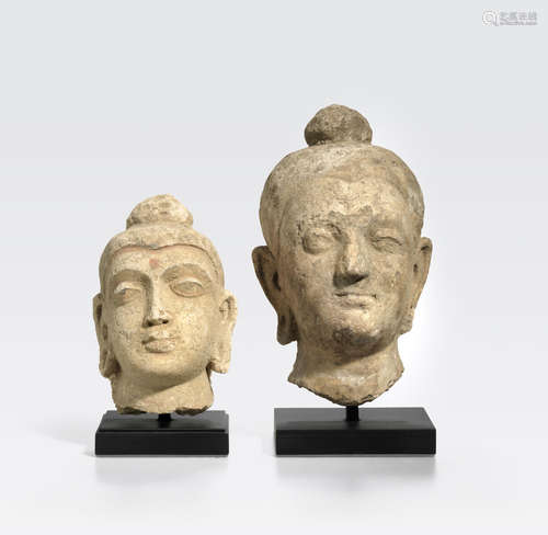 Two stucco heads of Buddha Ancient region of Gandhara, 4th/5th century