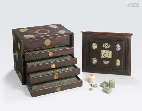 An unusual jade mah jong set in a wood storage case with applied jade plaque decoration Republic period