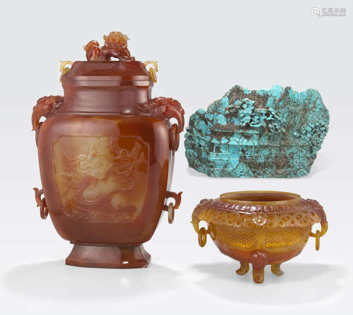 A group of three carved semi-precious stone decorations