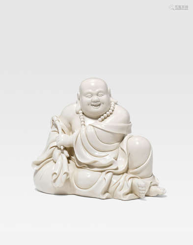 A white glazed seated figure of Budai 19th/20th century