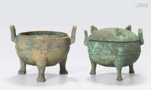 Two archaic bronze tripod vessels, ding Han dynasty
